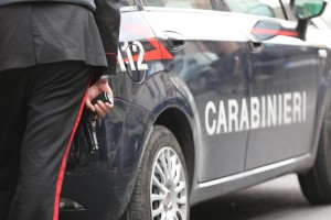 Police and Carabinieri in action during the shooting where four people were killed and five wounded, Naples, Italy, 15 May 2015. Hospital nurse Giulio Murolo, 48, holed up in his flat with a pump-action shotgun. Murolo's wife, brother, sister-in-law and a traffic cop were killed. Four police and a civilian were wounded. ANSA/CESARE ABBATE